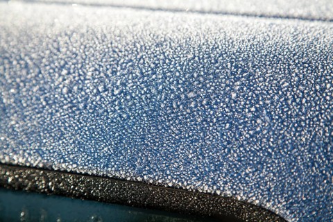 Freezing Ice crystals frost cold morning car roof winter UK