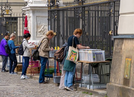 Tourists at the flea market stall in front of Humboldt University, Unter den Linden, Berlin,