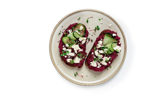 Sandwiches with beetroot hummus, cucumber and blue cheese, microgreens, rye bread, breakfast,