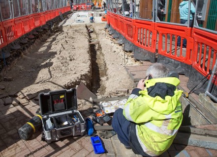 Male BT Openreach broadband technician working in town centre of Ipswich, Suffolk, England, UK