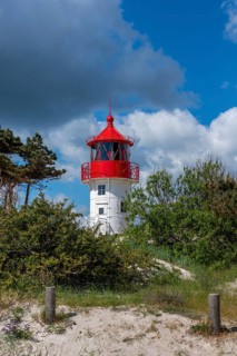 The Gellen lighthouse rises at the southern tip of the island of Hiddensee, Vorpommersche