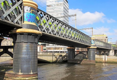 Loopline rail bridge or Liffey viaduct spanning river from Pearse railway station, Dublin, Ireland,