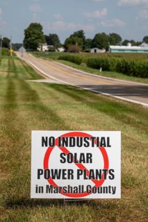 Rutland, Indiana, A sign along a rural road opposes a solar power installation in Marshall County