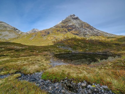 Øvstevatnet with mountain, autumn in Reinheimen National Park, Møre og Romsdal, Norway, Europe