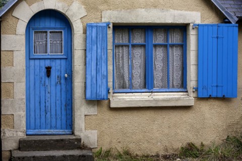 Old house facade with blue door and blue window, Ile de Brehat, Brittany, France, Europe
