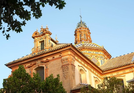 Ornately decorated domed roof of Iglesia Santa María Magdalena church in central Seville, Spain,