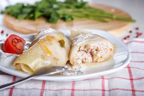 Cabbage rolls with beef, rice and vegetables on a linen tablecloth on a linen tablecloth. close up