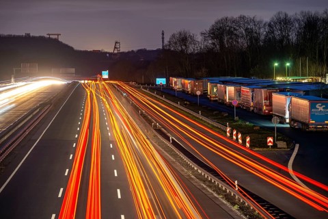 Evening traffic on the A2 motorway at the Recklinghausen junction heading west, in the background