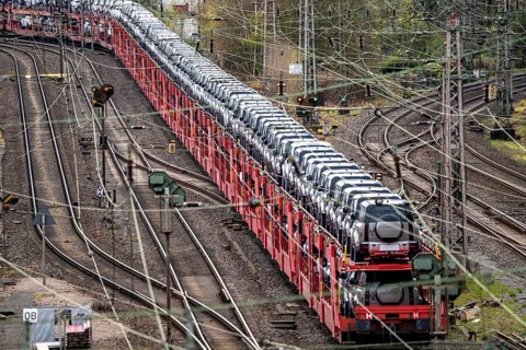 Freight train, car train with Landrover new cars on the goods train line at the Hagen-Vorhalle