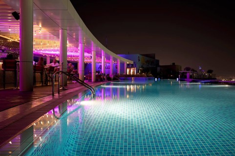 Night shot rooftop pool, swimming pool, Hotel NH Collection The Palm Jumeirah, Dubai, United Arab
