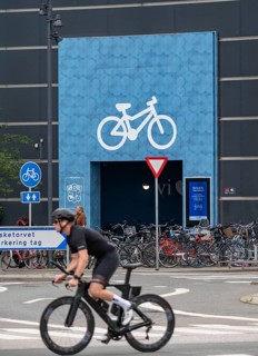 Cyclists on cycle paths, bicycle parking garage at the Fisketorvet shopping centre, Sydhavnen, in