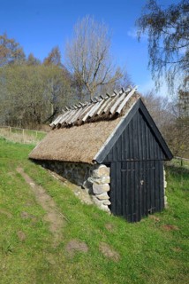 Old thatched fishing hut in Knäbäckshusen, a small fishing village near Rörum, Simrishamn