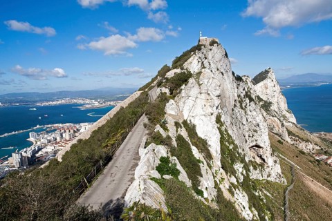 Sheer white rock mountainside the Rock of Gibraltar, British territory in southern Europe