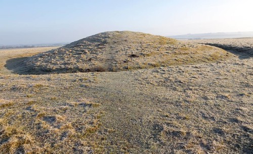 Bronze Age bowl barrow on Windmill Hill, a Neolithic causewayed enclosure, near Avebury, Wiltshire,