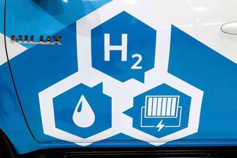 H2 hydrogen fuel cell logo on a Toyoa Hilux Fuel Cell Electric Vehicle at the IAA Transportation
