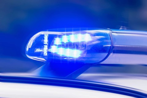 Close-up of a police blue light in action, illuminated and ready for use in an emergency, patrol