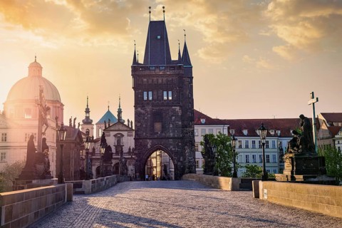 Charles bridge tower in Prague on sunrise, Czech Republic, Europe