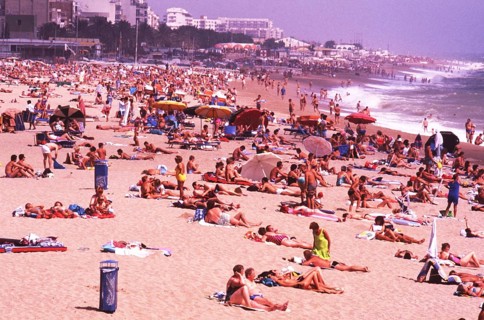 Crowded beach with sunbathers in Calella, Costa Brava, Barselona, ??Catalonia, Spain, Southern