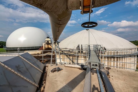 Biogas plant, gas storage, with dome, use of solid manure as energy source, gas pipelines, on a