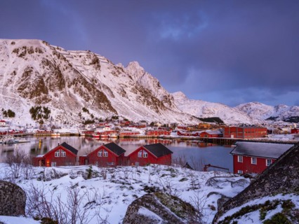 Red huts at the harbour, Skottinden mountain in the background, Ballstad, Vestvagoy Island,