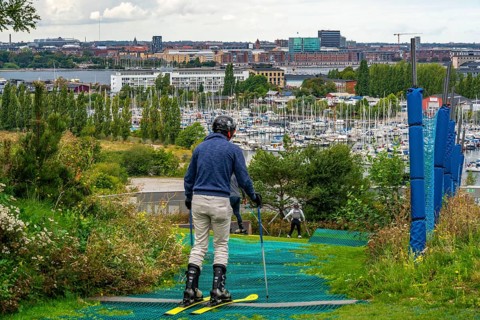 CopenHill, waste incineration plant and artificial ski slope, skiing with a view of Margretheholms