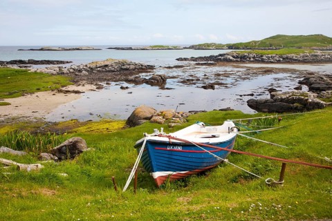Small fishing boat on the east coast of Barra, Outer Hebrides, Scotland, UK