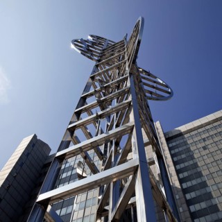 Sculpture by Nicolas Schöffer entitled Chronos 15, light-kinetic tower in front of the Stadthaus,