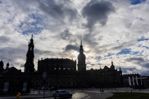 Rainy weather in Dresden's old town. The steep winter sun emphasises the silhouettes of the