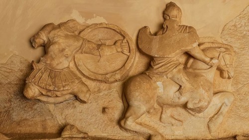 Stone relief of a horseman in battle, battle of the Greeks against the Amazons, richly detailed
