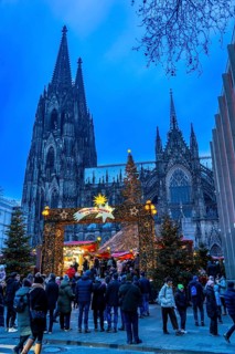 Christmas market at Roncalli Platz am Dom, in the city centre of Cologne, Sunday shopping in