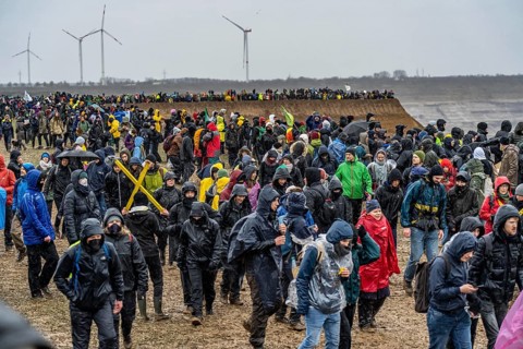 Many thousands of demonstrators march after a demonstration against the demolition of the lignite