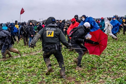 Violent clashes between thousands of demonstrators and the police, after a demonstration against