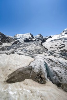 High alpine glaciated mountain landscape, La Jonction, Glacier des Bossons meets Glacier de