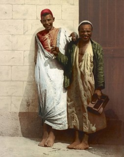 Shoeshine boy, Cairo, Egypt, digitally restored reproduction from a 19th century original, record