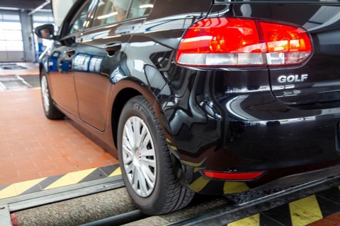 VW Golf on the brake test bench (brake test) during the main inspection