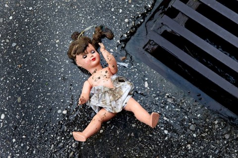 Doll as a symbol of maltreatment and abuse of children, Vienna, Austria, Europe