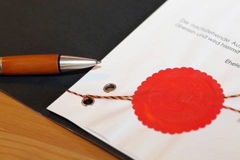 Notarised contract with red official seal