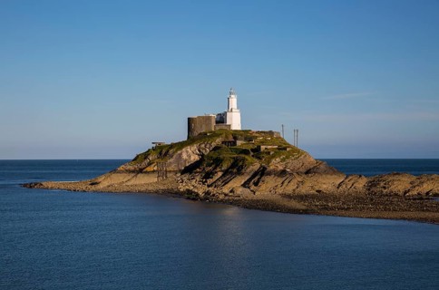 Lighthouse at Mumbles Head, Gower peninsula, near Swansea, South Wales, UK
