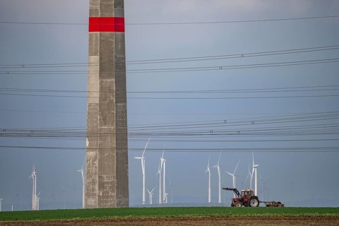 Wind farm north-east of Bad Wünnenberg, near the village of Elisenhof, farmer working in the field
