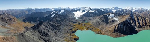 Mountain panorama, aerial view, 4000 metre peak with glacier, mountain pass and mountain lake