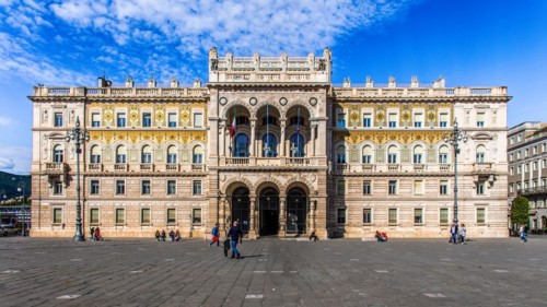 Palazzo del Governo with oriental-looking golden mosaic tiles, Piazza Unità d'Italia in the heart