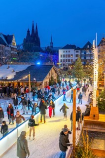 Ice rink at the Christmas market on the Heumarkt in the old town of Cologne, Cologne Cathedral,