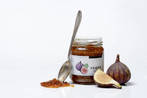 Fig jam in a jar and fresh figs, Ficus carica