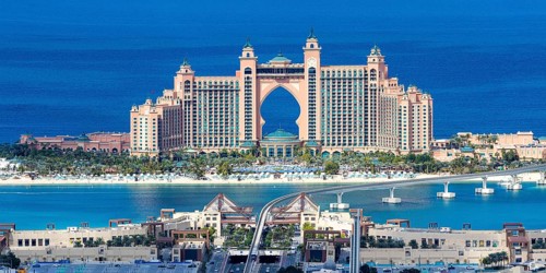 The Palm Jumeirah with Atlantis Hotel Panorama artificial island from above in Dubai, United Arab