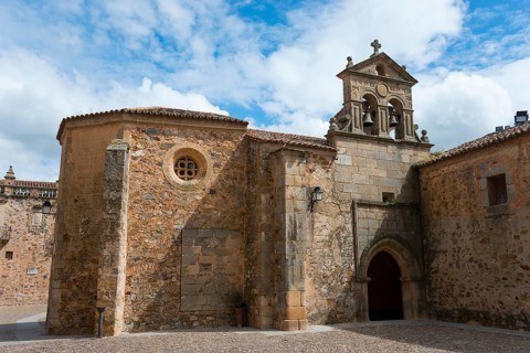 Historic church with stone walls under a blue sky, Convento de San Pablo, nunnery, old town,