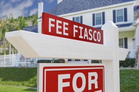 Fee fiasco for sale real estate sign in front of new house