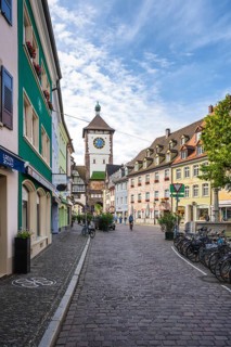 Herrenstraße with the Schwabentor, medieval city gate in the historic city centre of Freiburg im