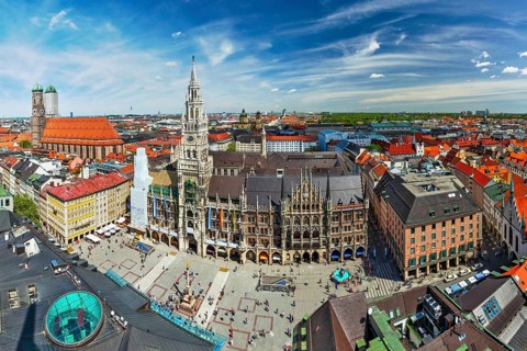Aerial fish eye view of Munich, Marienplatz, Neues Rathaus and Frauenkirche from St. Peter's church