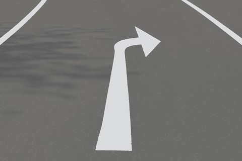 Road with arrow pointing to the right