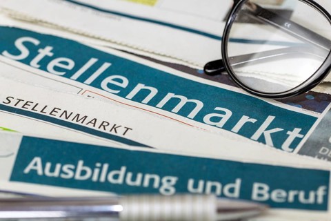 Symbolic image of the labour market in Germany: excerpts from a newspaper